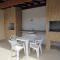 Apartamento completo p temporada Ubatuba, excelente localização com conforto e economia - أوباتوبا
