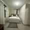 Man and Dog Log Cabin - Midrand