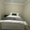 Man and Dog Log Cabin - Midrand