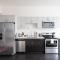 Flexhome Skywalk to Fiserv U3 with Rooftop, Gym, and Parking - Milwaukee