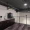 Modern 1BR Apt with Skywalk to Fiserv, Rooftop, and Parking