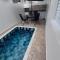 Casa nova em condominio com piscina e churrasqueira privativa - 伊塔尼亚恩