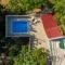 stone house Nikolina with heated Pool - Bast