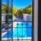 Villa Nika - Rustic Stone House with Heated Pool