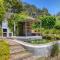 Solar-Powered Mountain Retreat with Natural Pool
