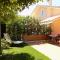 MillyHolidays - Apartment Lillà in the Center with Private Garden and Spa Pool