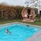 vakantiewoning met permanent verwarmd zwembad en sauna - Koekelare