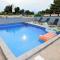 Apartman "Sabine" with heated pool