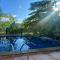 Rooms & Pool Macaws