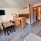 LEnchalpe, Grand et lumineux studio avec coin montagne 5 personnes, 60m des pistes, PISCINE COUVERTE, WIFI, grand balcon expo EST, DRAPS NON COMPRIS