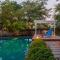 Morning Dew Retreat by StayVista - Modern interiors, Indoor games, Lush greenery, Pool & Gazebo await your escape