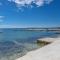 Beachfront Apartments Tolo with Pool
