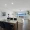 Frangipani Beachfront Lodge 202 on Hamilton Island by HamoRent