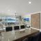 Frangipani Beachfront Lodge 202 on Hamilton Island by HamoRent