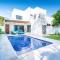 Ultramodern Townhome with an Inviting Coastal Design and Lush Outdoor Oasis with a Private Pool