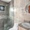 Ultramodern Townhome with an Inviting Coastal Design and Lush Outdoor Oasis with a Private Pool