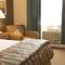 Magnuson Grand Pioneer Inn and Suites
