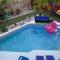 Urban Oasis withHot Tub, HEATED POOL and Private Movie Theater home - ملبورن Urban Oasis withHot Tub, HEATED POOL and Private Movie Theater home - ملبورن