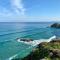 Sunset Waves Sea view apartment featuring panoramic views & parking - 纽基
