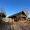 Woodpecker Log Cabin with hot tub, pizza oven bbq entertainment area, lakeside with private fishing peg situated at Tattershall Lakes - Tattershall