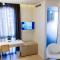 The Rooms Serviced Apartments Tirana