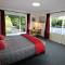 Labyrinth Gardens Guest House - 塔卡卡