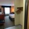 Merit Hotel & Suites