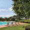 Immersed in a wide Italian-style meadow with a breathtaking view on the countrys - Arezzo