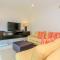 3-Level Condo with a Private Balcony & Rooftop Lounge