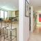 3-Level Condo with a Private Balcony & Rooftop Lounge