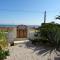 Villa at seafront with private garden-655