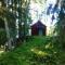 Tiny hut in the forest overlooking the river - Avesta