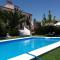 Apartamentos Turísticos - Hostal Los Alisos