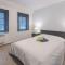 Apartment Vosseslag II duplex sunny appartment by Interhome