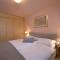 Apartment Chesa Maurus A5 by Interhome