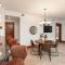 Modern Riverstone Condo with Grand Deck - Steps to Shops, Restaurants, Trails and River