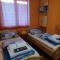 Éva Apartmanház - إغير