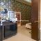 Hotel Puri Yasmin Potowanua Lasusua Mitra RedDoorz