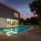 Twilight Grove by StayVista - Pool- view villa with Manicured lawn, Contemporary interiors & Home theatre