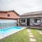 Casa com piscina, wifi e churrasqueira em unamar.