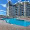 Colorful Beachfront Condo with Resort Amenities