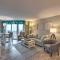 Colorful Beachfront Condo with Resort Amenities