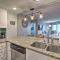 Colorful Beachfront Condo with Resort Amenities
