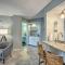 Colorful Beachfront Condo with Resort Amenities