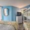 Colorful Beachfront Condo with Resort Amenities