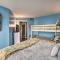 Colorful Beachfront Condo with Resort Amenities