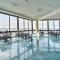Colorful Beachfront Condo with Resort Amenities