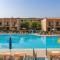 Enjoy a poolside retreat - Beahost - 卡奥莱