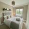 Modern Cottage Style House with Log Burner