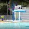"Bungalow familial à Saint-Brevin-les-Pins avec piscine partagée"